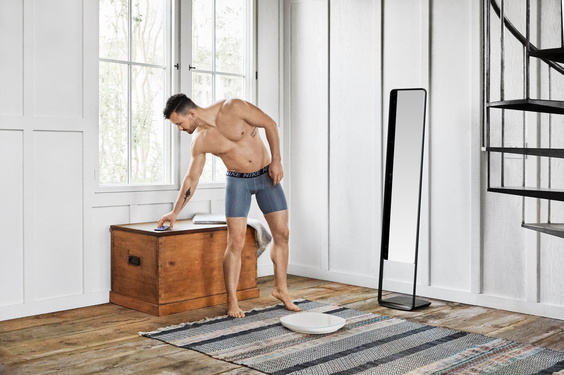 naked-labs-naked-home-body-scanner-man-with-smartphone.jpeg